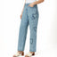 Light blue relaxed straight jeans with embroidered hearts, paired with cream block heel sandals