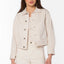Peton cropped denim jacket in cream with silver snap buttons, chest pockets, and contrast stitching detail