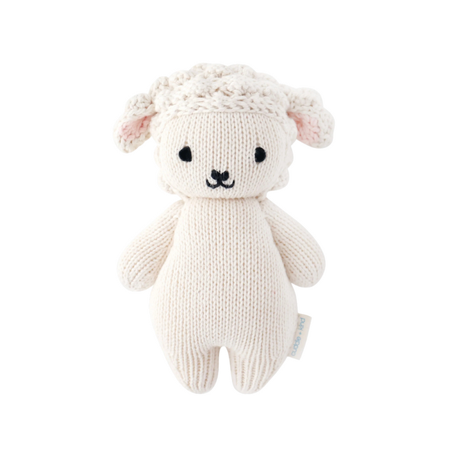 Knitted toy sheep on a white background Main image