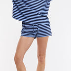 Person wearing a blue and navy striped outfit 