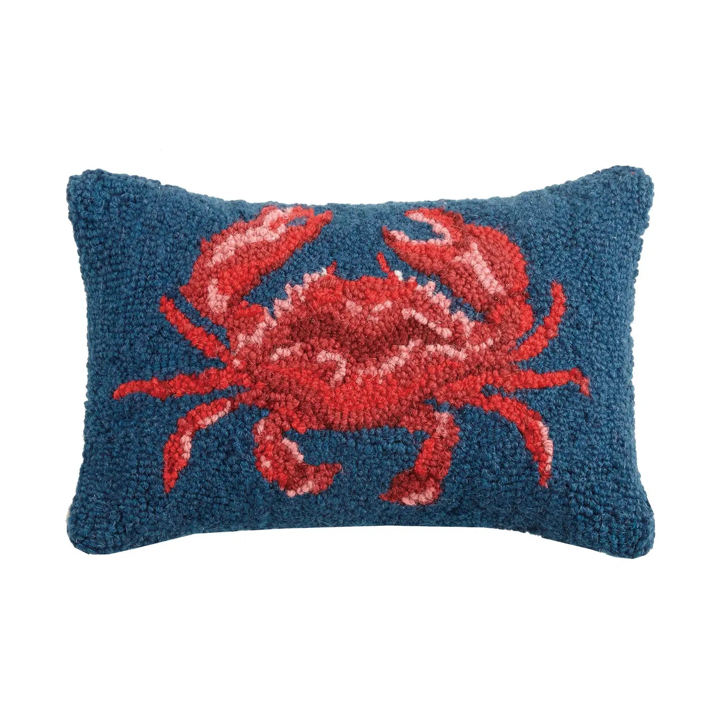 Red crab hook pillow with textured details on navy blue background, coastal home decor