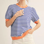 Women's navy and white striped short-sleeve tee with orange ribbed trim at neckline, cuffs, and hem