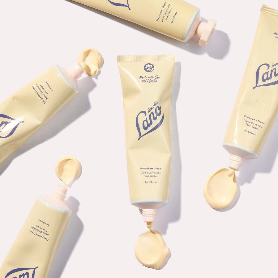 Lanolin Everywhere Cream tube with swatches showing pale yellow moisturizing cream texture and consistency Main image