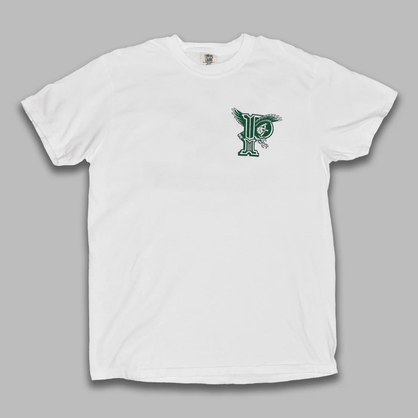White t-shirt with a green logo on a gray background