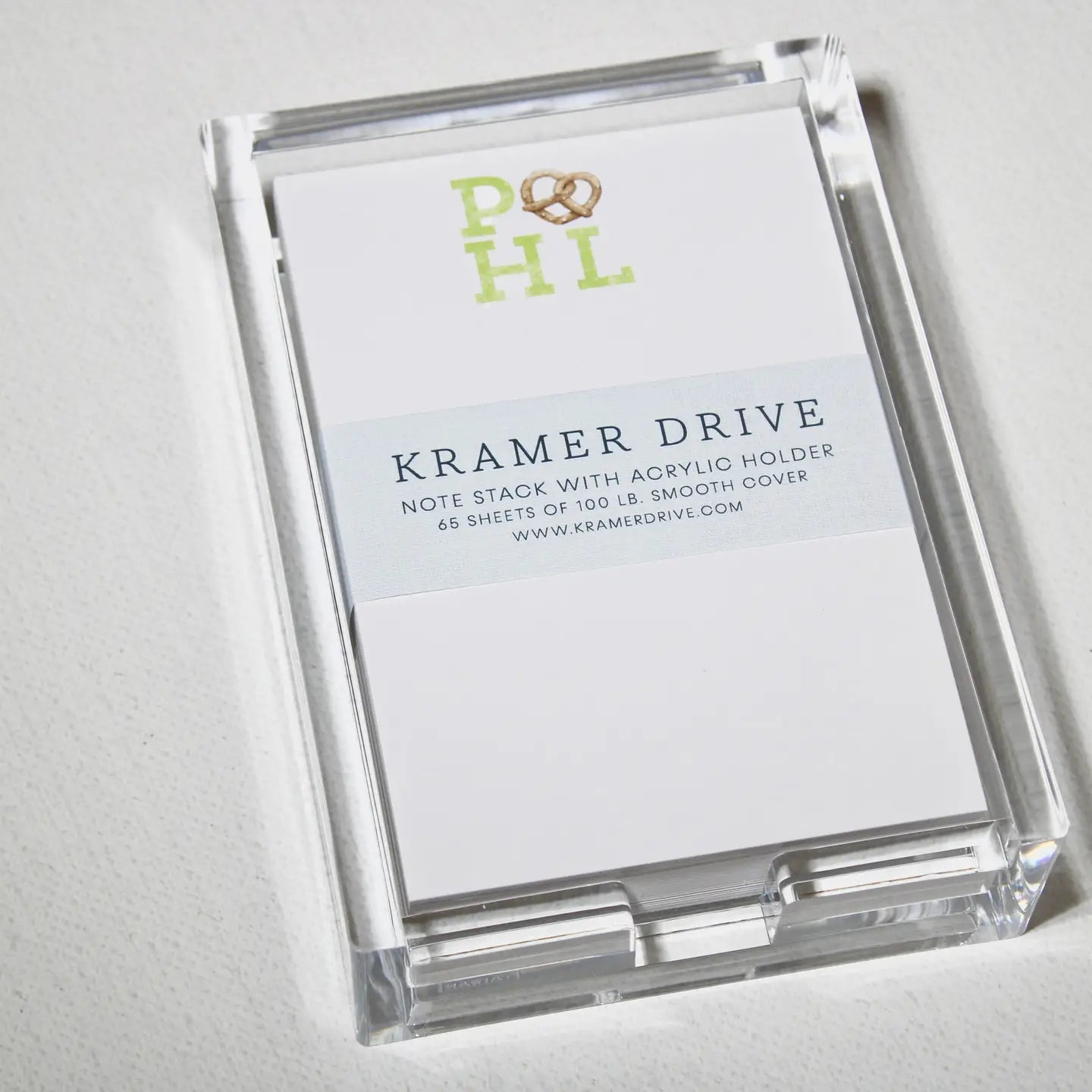 Philadelphia PHL pretzel note stack with acrylic holder containing 65 sheets and smooth cover in clear packaging Main image