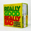 Really Good Really Bad board game box with yellow background, green and red text, showing game title and blue cheese rating …