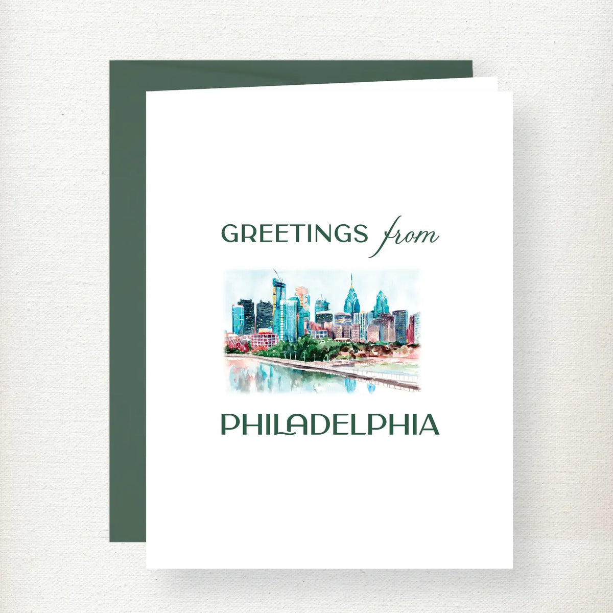 Greetings from Philadelphia skyline greeting card featuring watercolor illustration of iconic buildings and river with green…