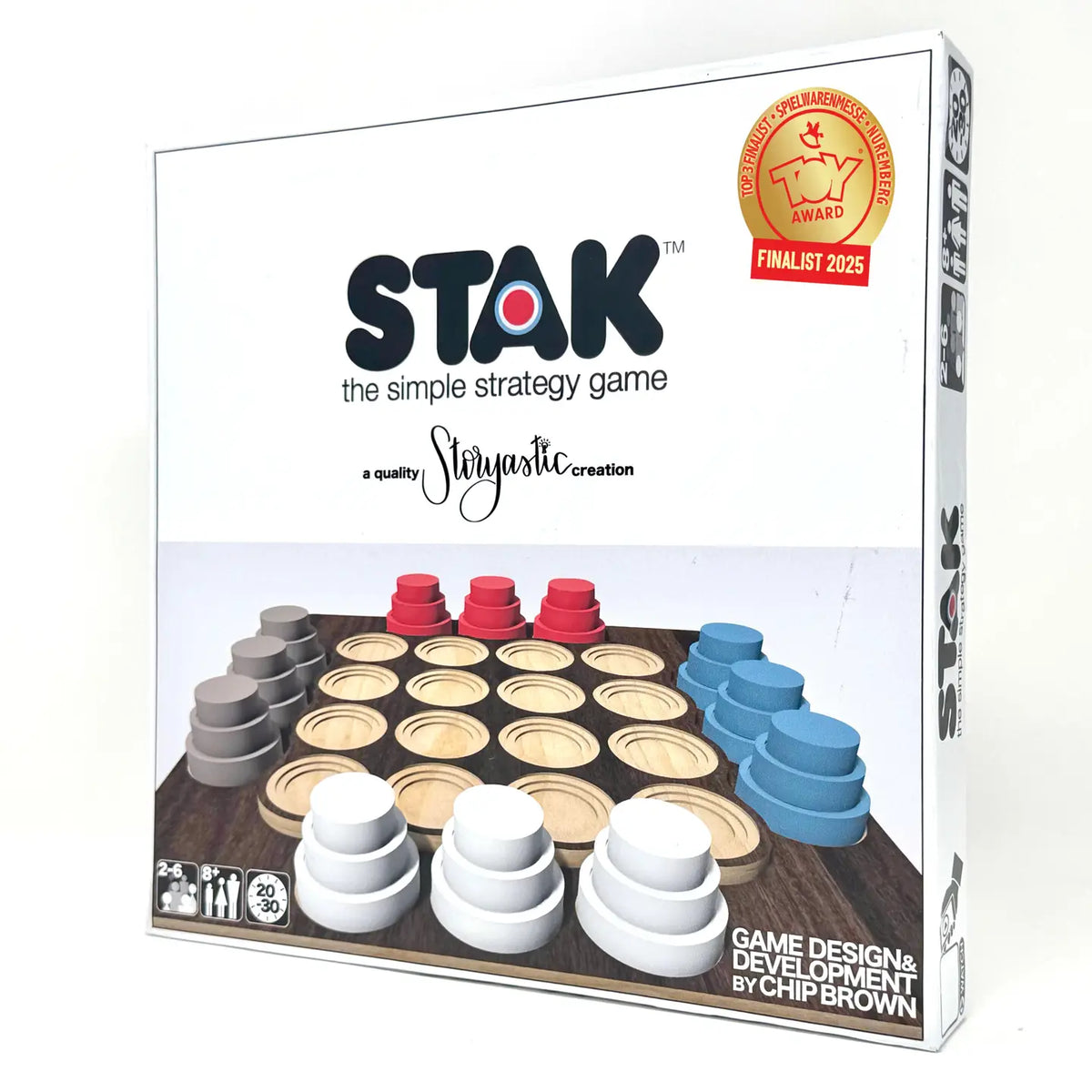 STAK strategy board game with stacked pieces in red, blue, white, and gray on wooden game board with cream-colored spaces
