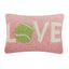Pink hooked pillow with cream letters spelling LOVE and a green tennis ball in the center