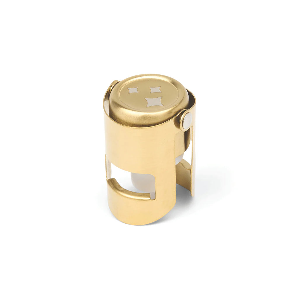 Timmy Champagne Stopper in polished gold brass with engraved cross design on top