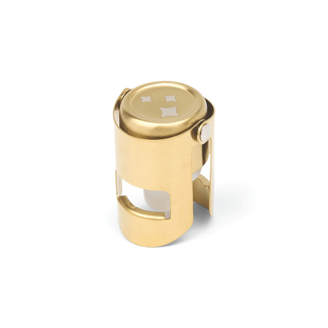 Timmy Champagne Stopper in polished gold brass with engraved cross design on top