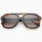 Tortoise sunglasses against a white background. 