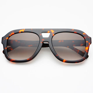 Tortoise sunglasses against a white background. 