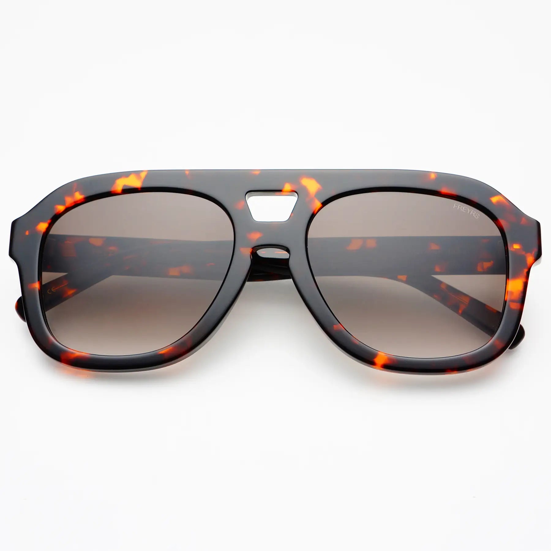 Tortoise sunglasses against a white background. 